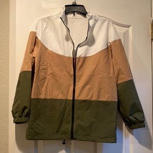 Light weight multi-color Jacket. Hardly worn, great condition. Small